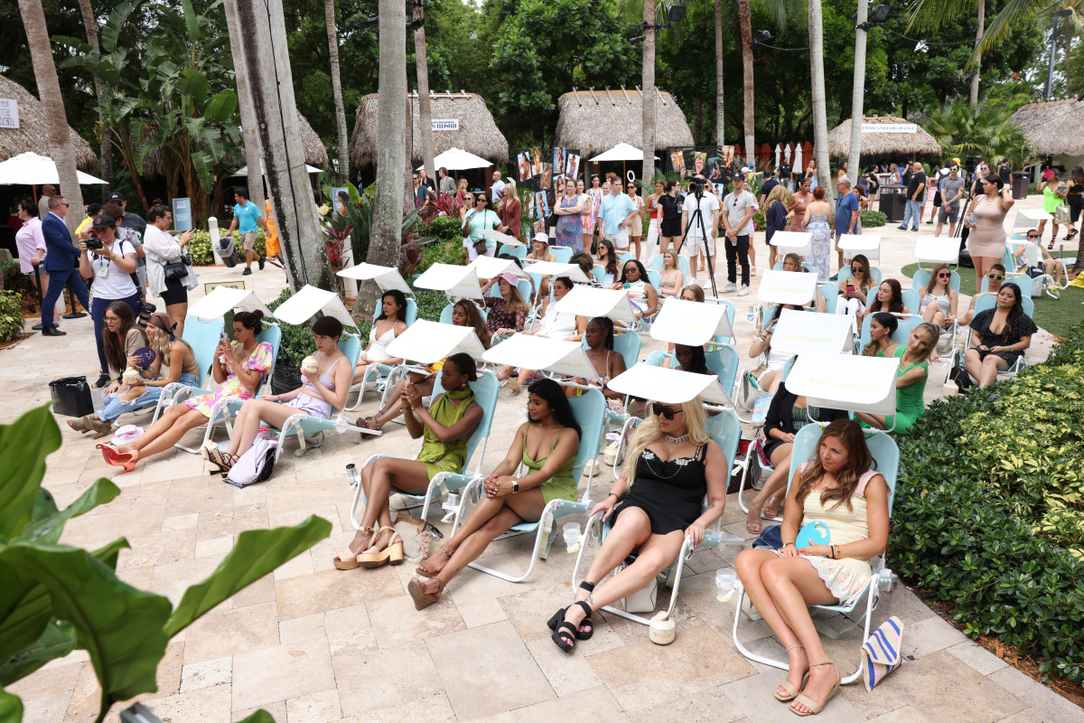 The crowd listening to SI Swimsuit panel discussions in Sunflow chairs at 2022 launch week.